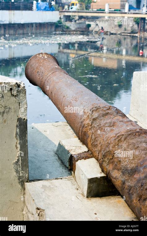 Old Dutch Cannons at Menara Syahbandar Watch or Lookout Tower Overlook Polluted River of Garbage ...