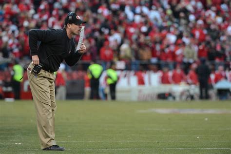 Jim Harbaugh breaks our hearts, continues to wear Dad Pants - CBSSports.com