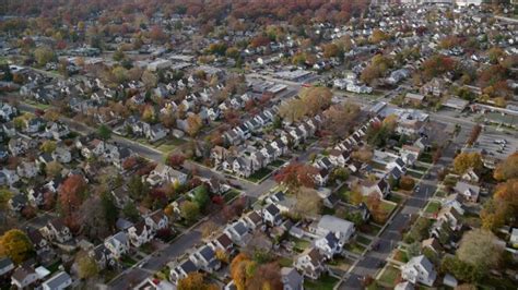 6K stock footage aerial video of quiet suburban neighborhoods in Autumn ...