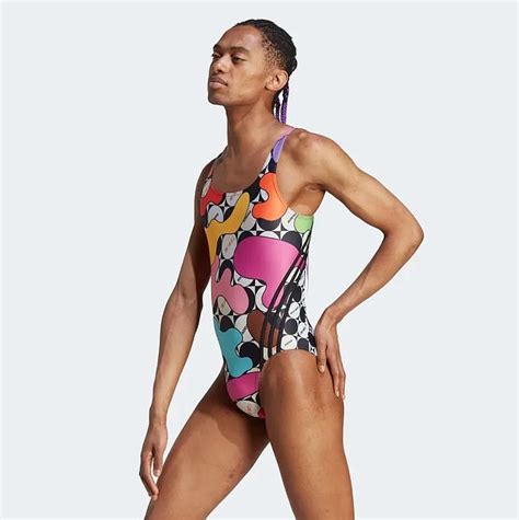 Adidas Pride 2023 women's swimsuit modeled by a man - NewsFinale