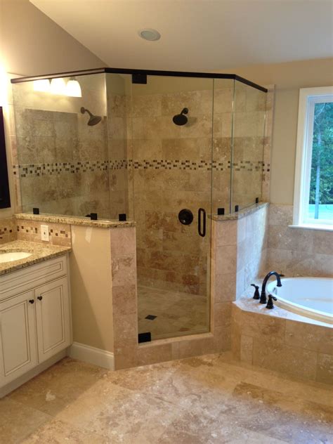 Frameless corner glass shower. dual shower heads. garden tub. tiled shower | Bathroom remodel ...