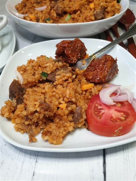 Jollof Rice (Ghana Style) • Curious Cuisiniere