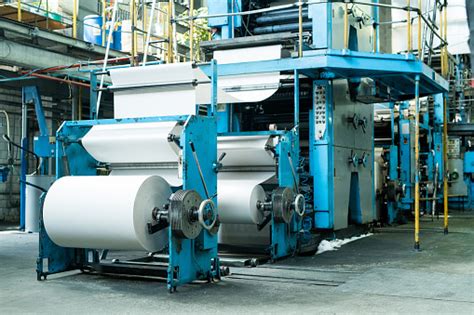 Large Printing Press With Paper Roll Printing Newspaper On Production ...