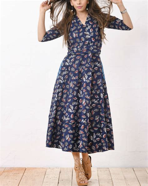 Blue printed flare dress by Charkhee Women | The Secret Label