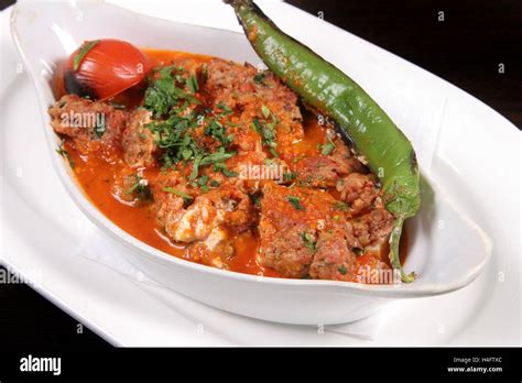 Beyti Kebab with tomato sauce Stock Photo - Alamy