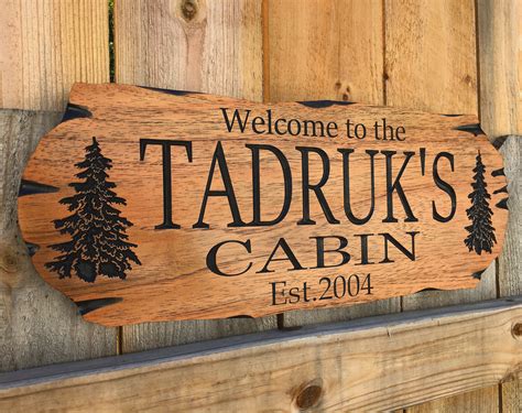 Personalized Cabin Sign Rustic Edge with Pine Trees: benchmarksignsandgifts.com