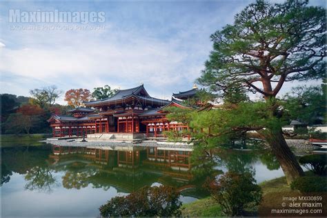 Photo of Beautiful Amida hall of Byodo-in temple on a pond in Uji Japan in morning sunrise ...