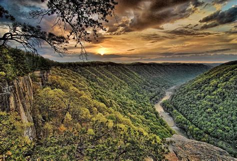 HD wallpaper: green valley near lake under cloudy sky, new river gorge, scenic | Wallpaper Flare