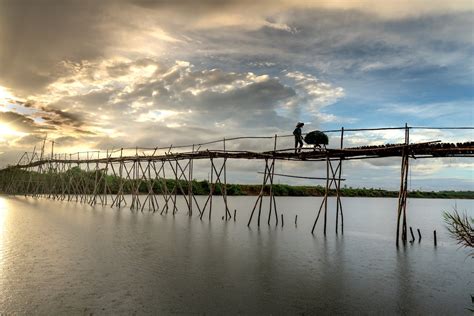 Wooden Bridge over a River · Free Stock Photo