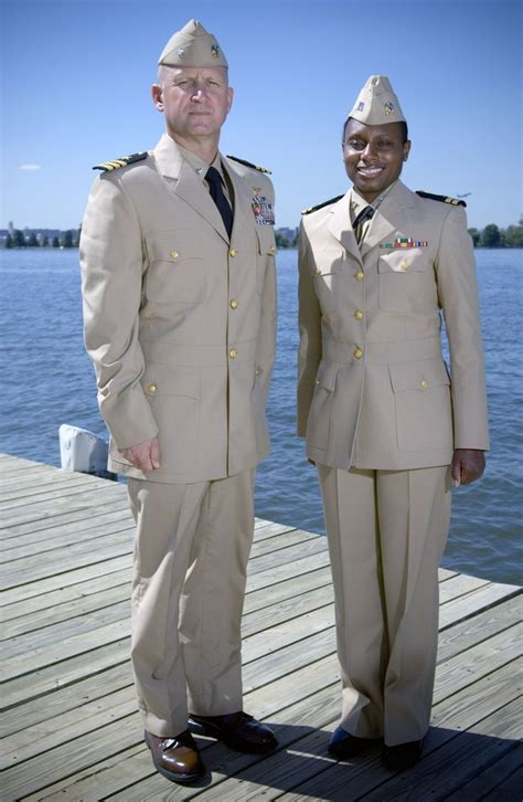 Two naval officers showcase the service dress khaki uniform in ...