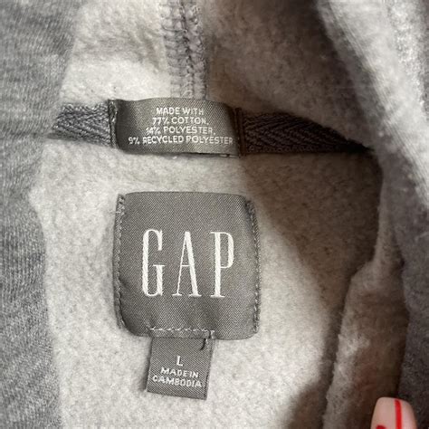 Gap grey and navy blue logo hoodie size large worn... - Depop