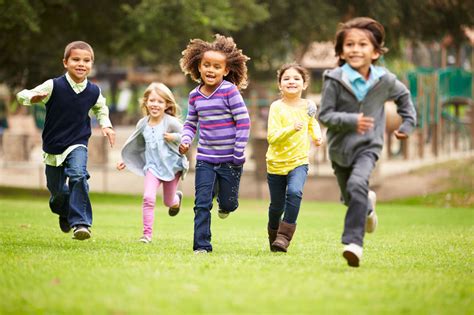 42308258 - group of young children running towards camera in park - G.R.O.W. Foundation, Inc.