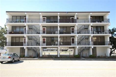 an apartment building with multiple balconies and balconyes on the ...