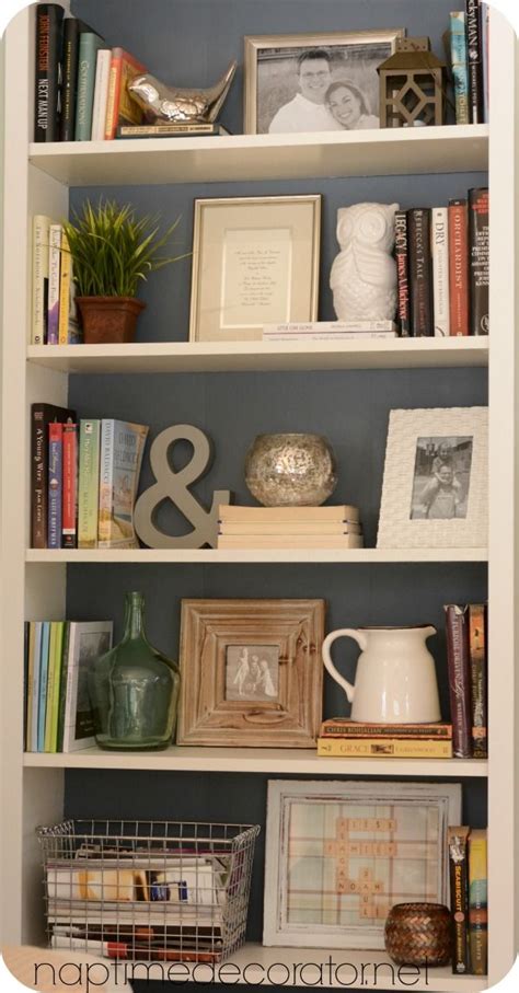 Styling Bookcases For a Much Used Family Room: Mixing Pretty and Necessity | Decorating ...