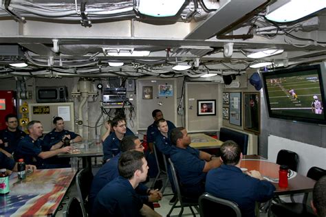 Crew members aboard USS Ohio (SSN 726) watch Super Bowl XLV while underway Uss Indiana ...