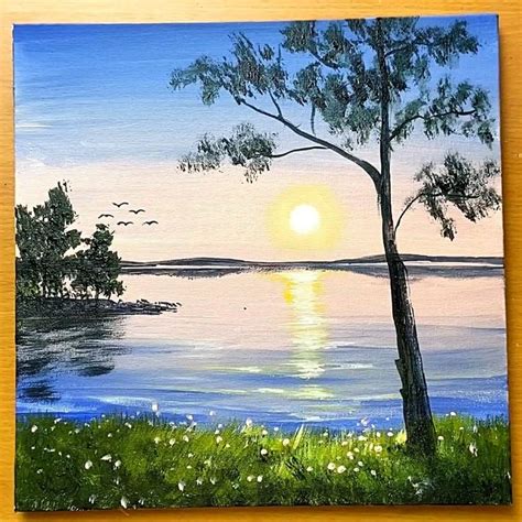 an acrylic painting of a tree and the sun setting over a body of water