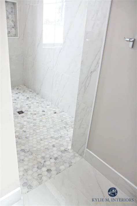 walk-in-shower-with-marble-hexagon-tile-floor-marble-walls-baseboard ...