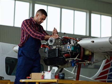 Free Photo | Engineer working with a airplane