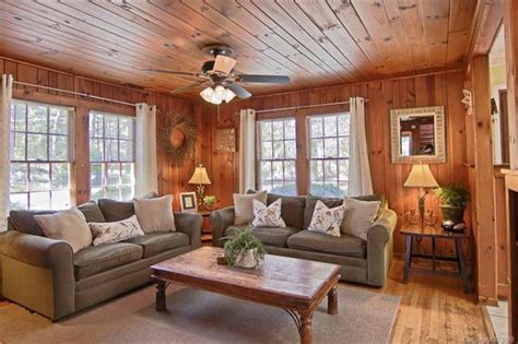 Nice decorating of a completely knotty pine room! | Cabin living room ...