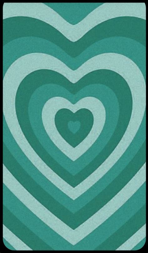 a heart - shaped pattern in shades of green and blue