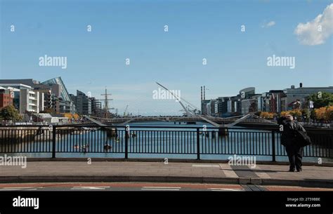 River Liffey view with tourist Stock Photo - Alamy