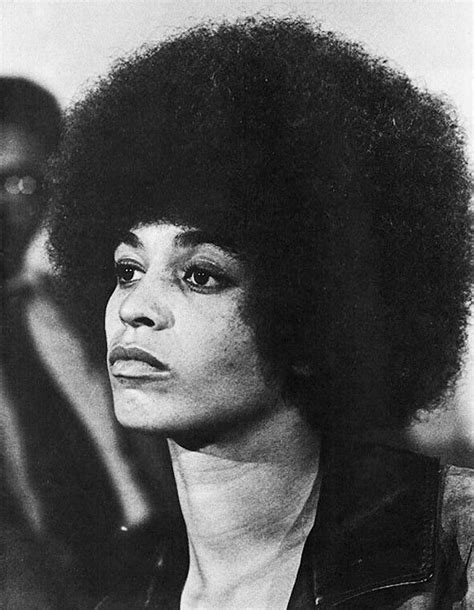 The afro symbolizes black pride. Political activist, scholar, author ...