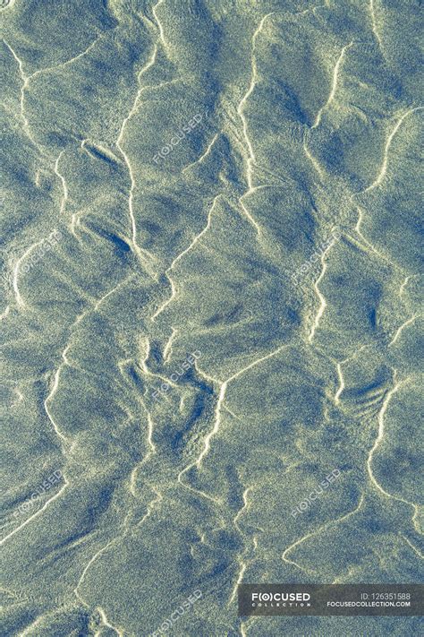 Beach sand texture — beauty in nature, low angle view - Stock Photo | #126351588