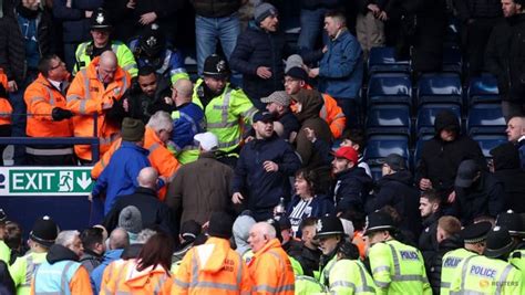 West Brom v Wolves interrupted after supporters clash - CNA