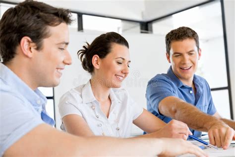 Group of Happy Young Business People in a Meeting Stock Photo - Image of happy, computer: 133317520