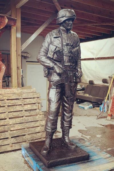 Life size military statues of a kneeling soldier for sale - Aongking Sculpture