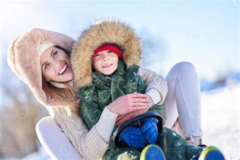 Nice happy family having fun on winter snow 15850827 Stock Photo at ...