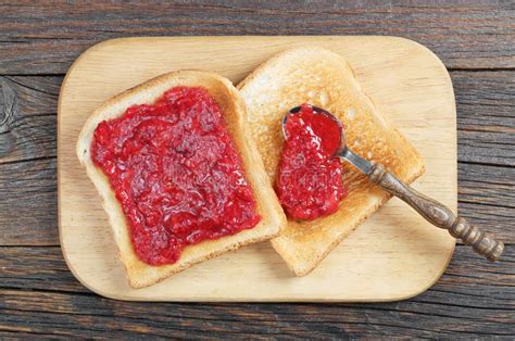 Toasted Bread with Strawberry Jam Stock Photo - Image of jelly, spoon: 118030548