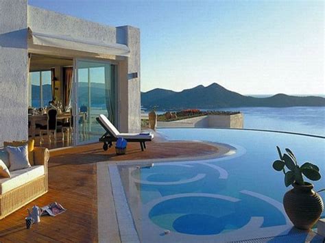 Elounda Gulf Villas & Suites, Elounda, Greece - Haus Kredit | Luxury beach resorts, Beach hotels ...