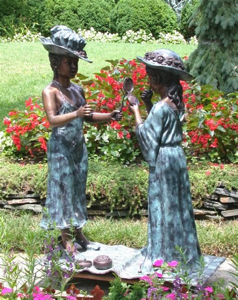 Bronze Girls playing Dress Up Sculpture | Metropolitan Galleries Inc.