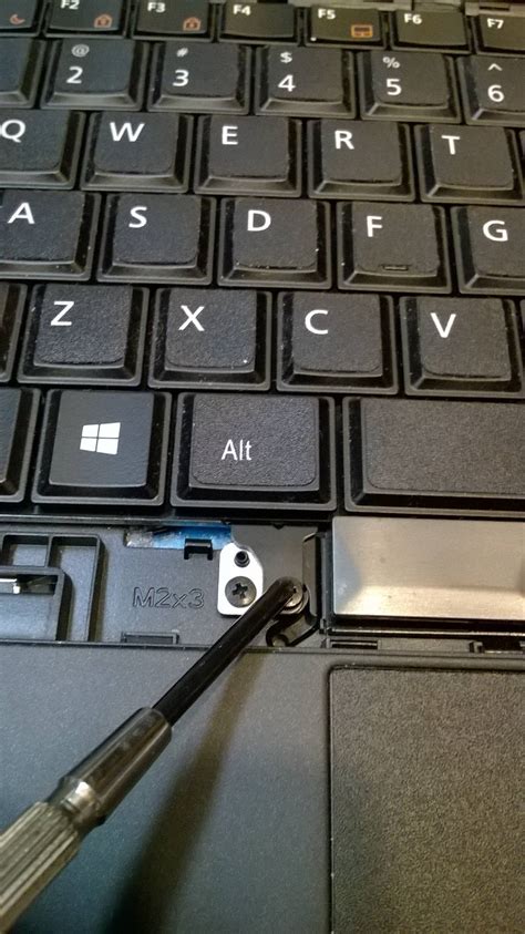 mouse - How can I permanently disable the Dell Pointstick? - Super User