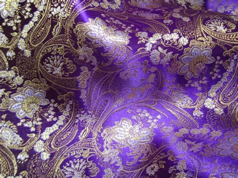 gold and white embroidered royal purple brocade | Brocade fabric, Gold fabric, Fabric