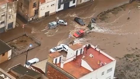 Spain floods: Cars washed away by torrential rain in aerial footage ...