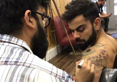 Aggregate 73+ virat kohli hand band tattoo latest - in.cdgdbentre