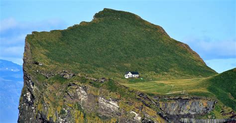 Lone House on Elliðaey Island in Westman Islands, Iceland - Encircle Photos