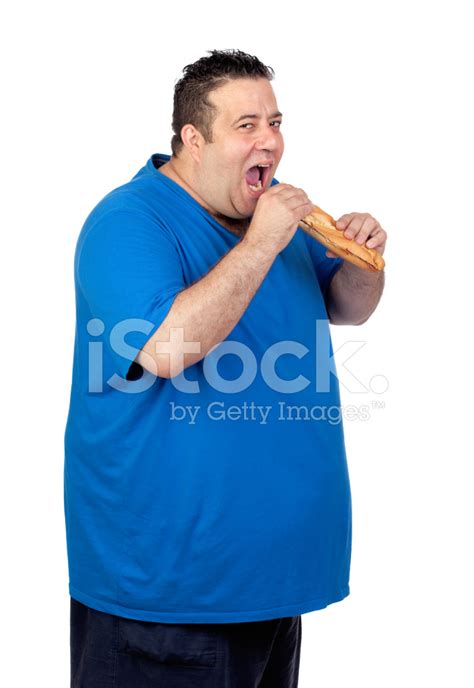 Happy Fat Man Eating A Large Bread Stock Photos - FreeImages.com