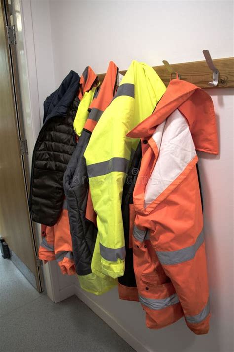 Bright High Visibility Jackets Hanging Stock Image - Image of colours ...