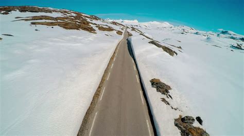 Mountain Road In Norway With High Snow Wall Stock Footage SBV-302439397 - Storyblocks