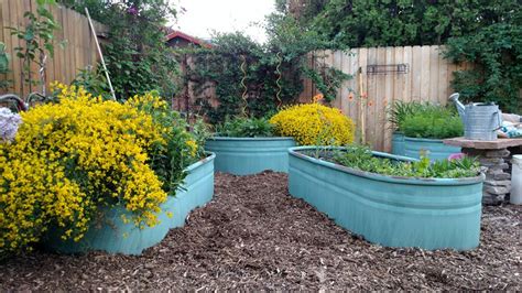 Stock Tank Planters. These were purchased as galvanized steel and then ...