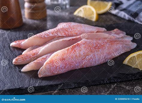 Fresh Ocean Perch Fillets stock photo. Image of board - 220005618