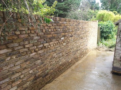 Rustic garden wall from reclaimed bricks in English Garden Wall bond with brick on edge. | Brick ...