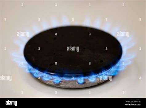 Natural gas burner blue flames Stock Photo - Alamy