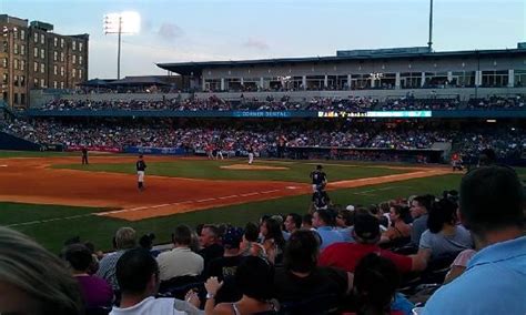 a baseball game in progress with the batter up to plate