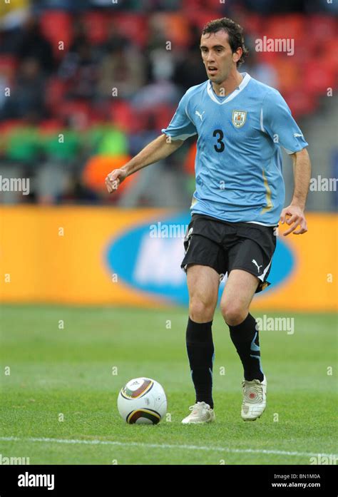 DIEGO GODIN URUGUAY V KOREA REPUBLIC NELSON MANDELA BAY STADIUM PORT ...