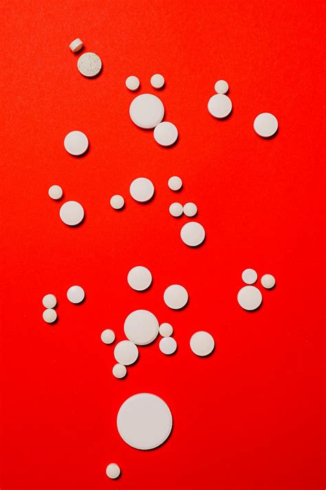 White Round and Red Surface · Free Stock Photo