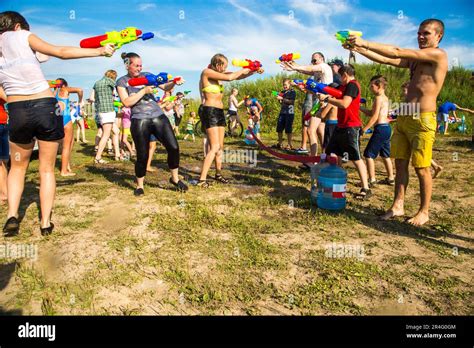 Children playing Water battle, water game battle Stock Photo - Alamy